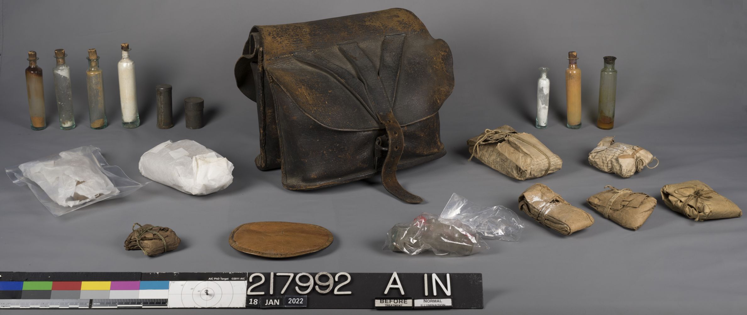 Inventory image, before treatment, of the medical saddlebag and all its contents. Together, there are twenty individual objects.  All images in the article were captured by Lorna Brundrett unless otherwise specified.