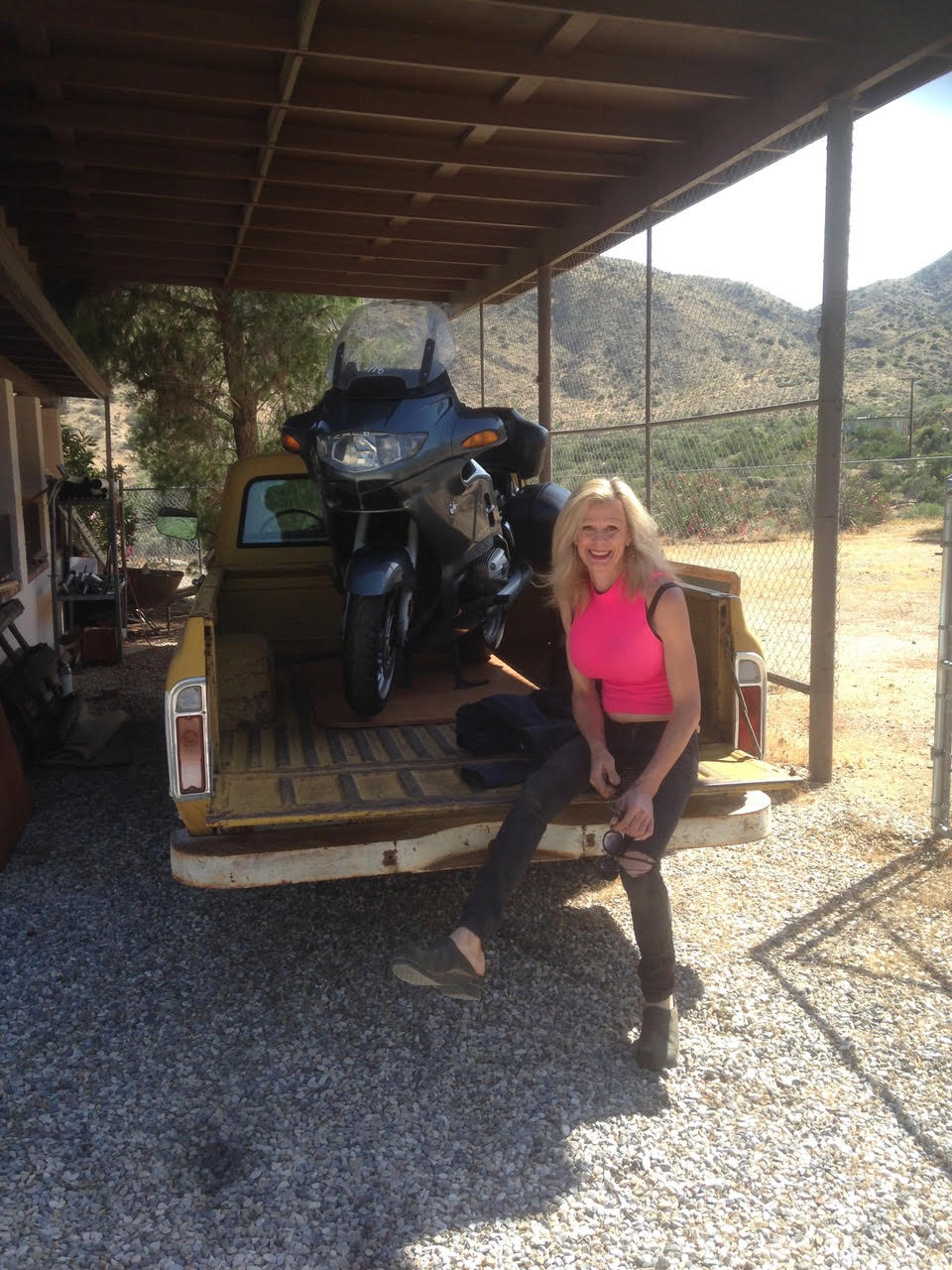 Robin Hodgson posing with her motorcycle. Image courtesy of Robin Hodgson.