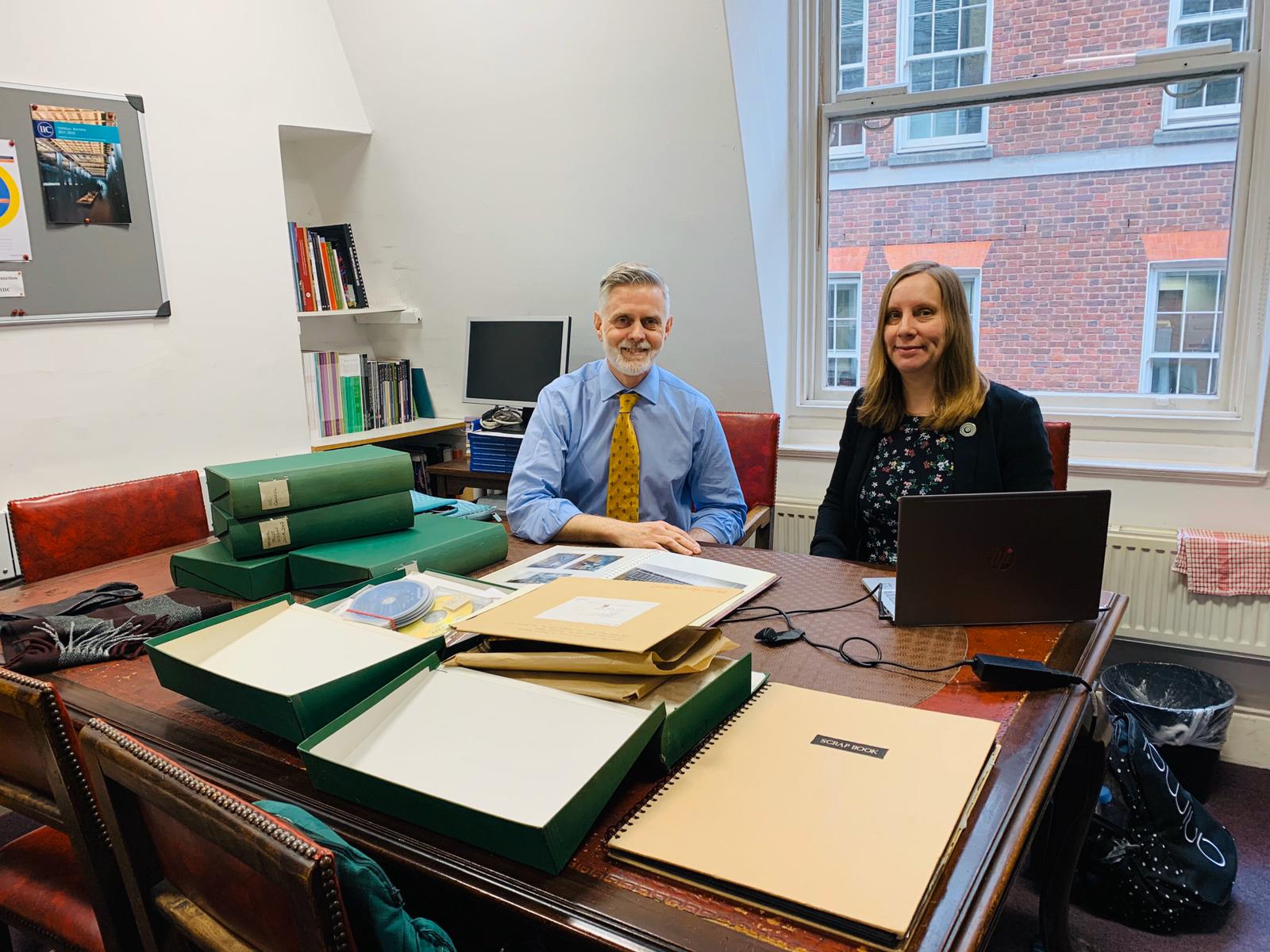 Graham Voce and Ellie Pridgeon surveying records in the IIC Office, London. Image by Tina Churcher, courtesy of the International Institute for Conservation of Historic and Artistic Works.